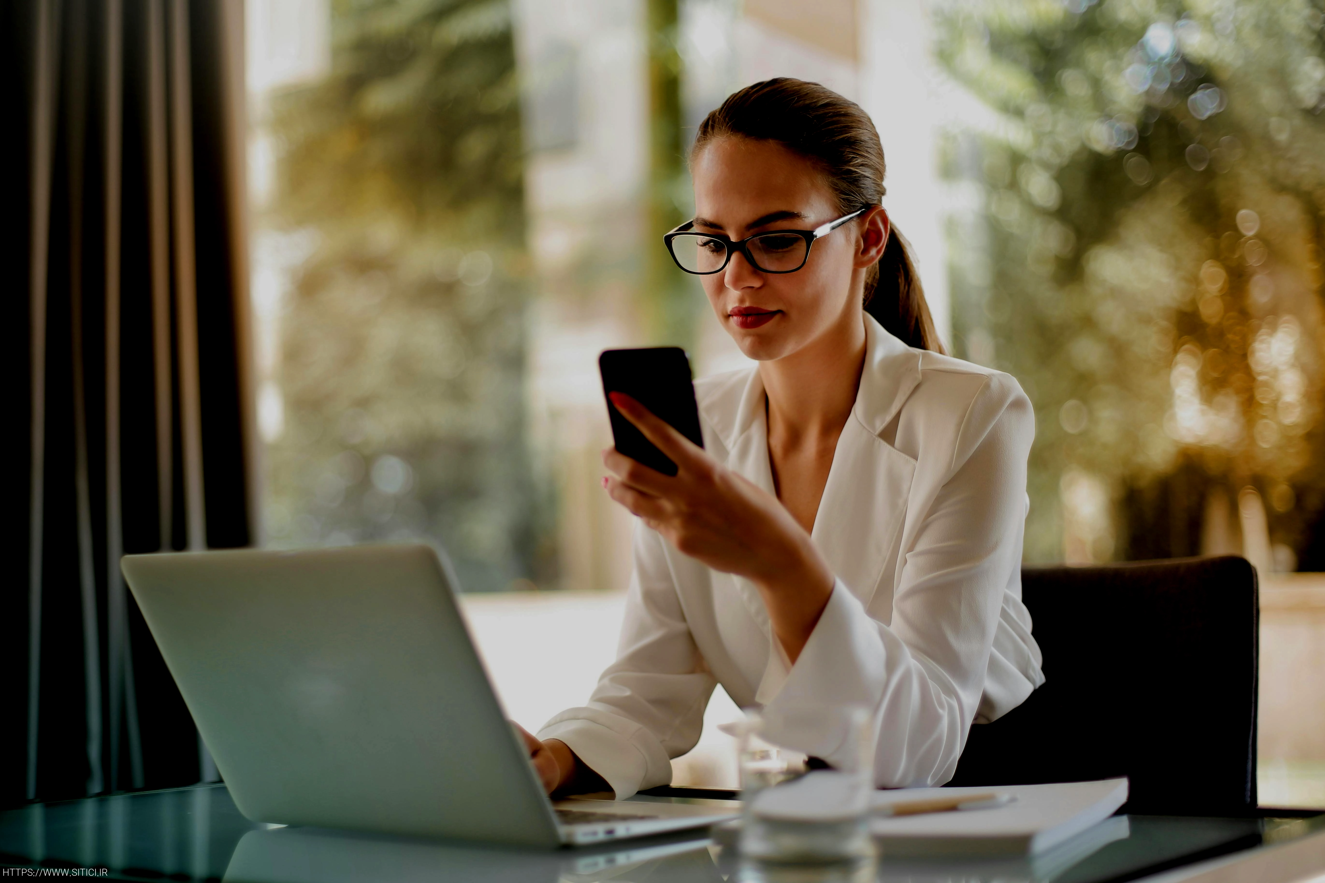 photo of person using smartphone
